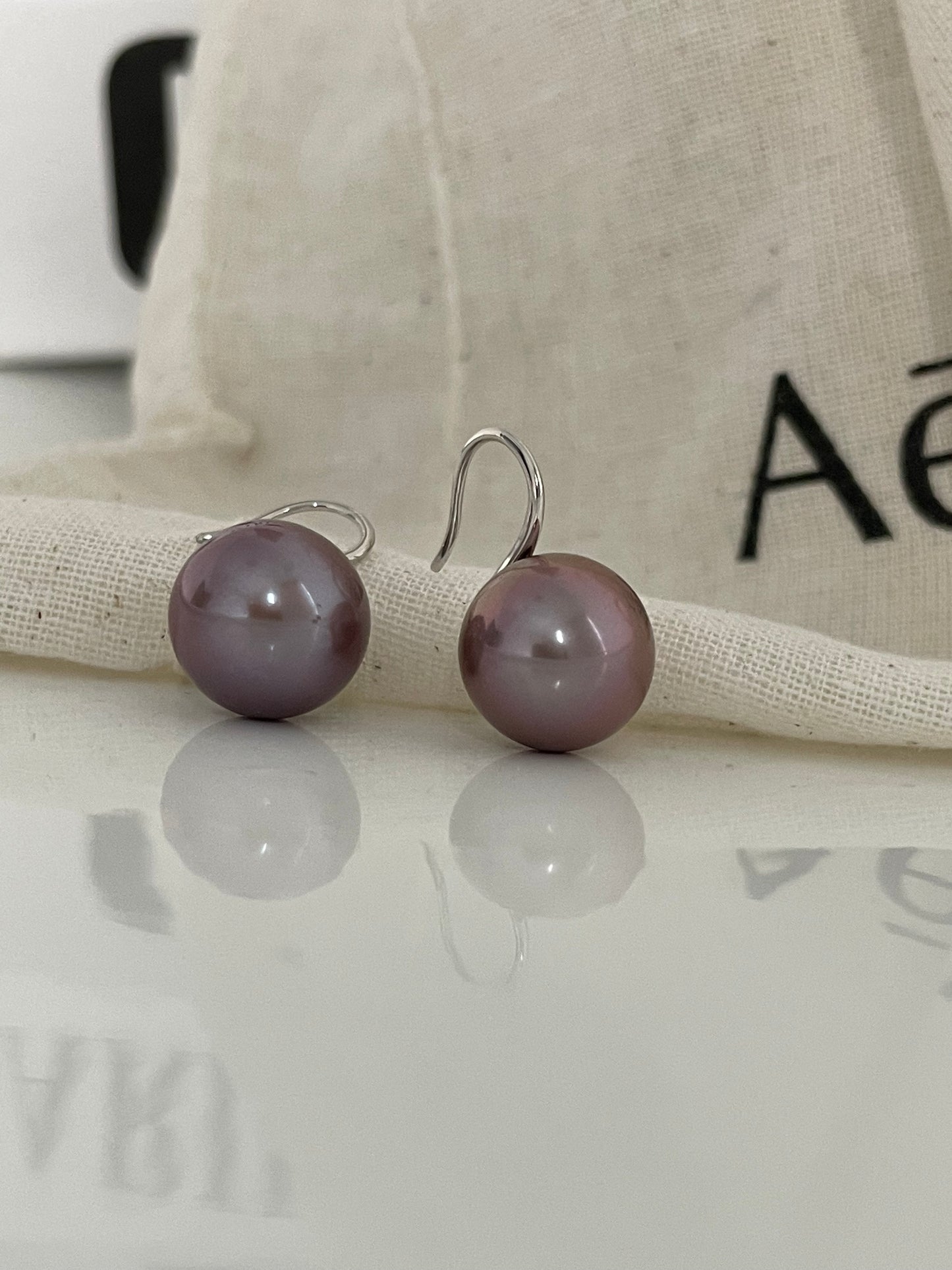 Platinum Plated Silver Hook Earrings with 12mm Purple Edison Pearl